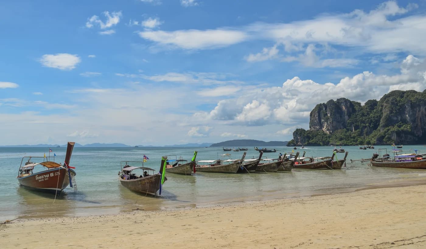 Longtail boats and limestone cliffs at West Railay Beach, 2015