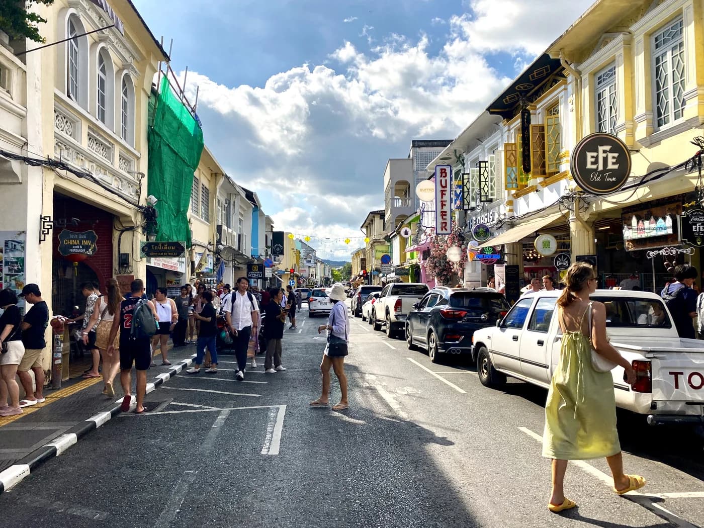 Shophouses and pedestrians on Thalang Road in Phuket Old Town, 2023